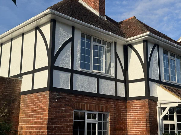 First-Floor Tudor Facade & Render Transformation